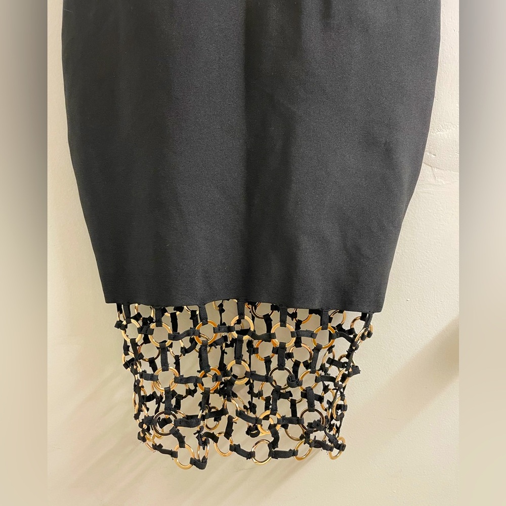 Elegant Black Backless Dress with Intricate Neckline - Picture 4 of 6